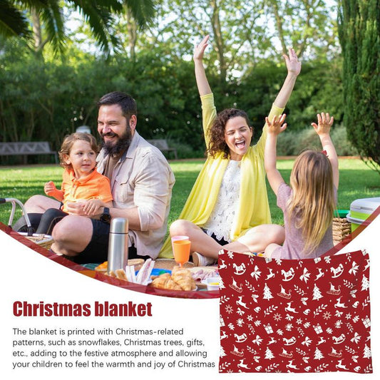 Family enjoying a Christmas flannel throw blanket
